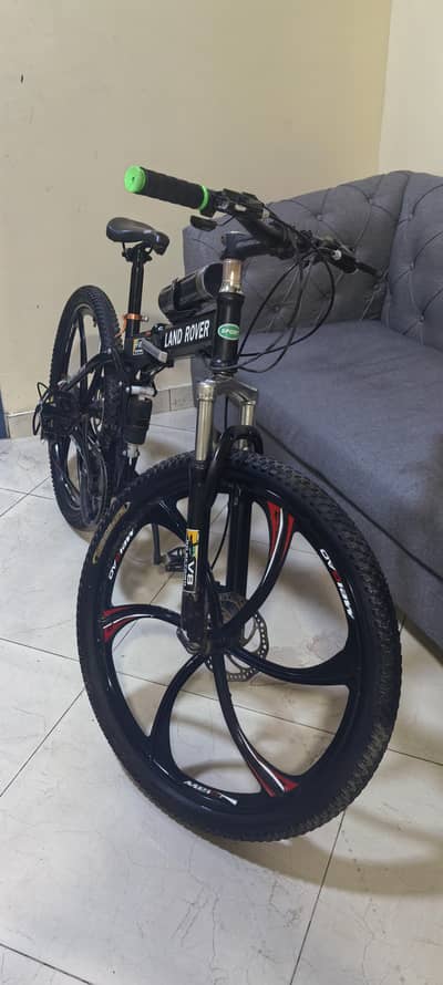 Land rover dual disc dual shocks