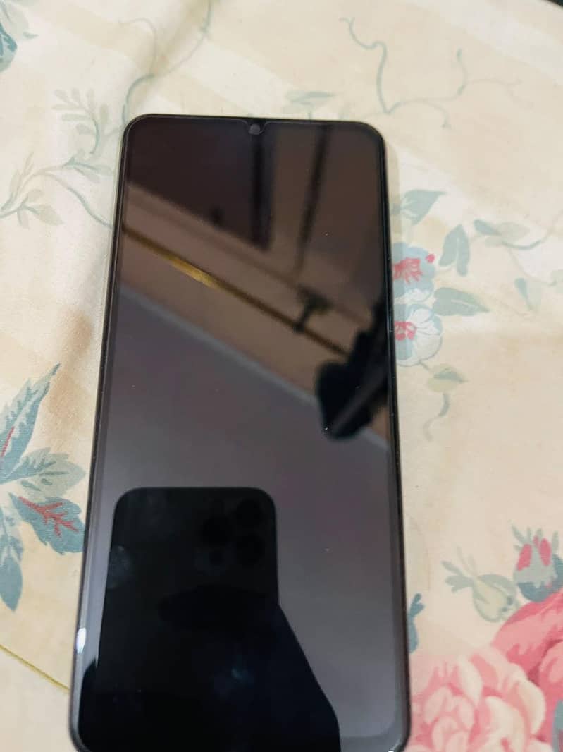 Realme Note 60x 4