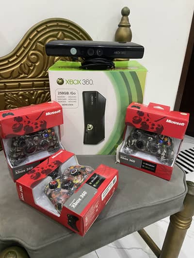 Xbox 360s with 4 remotes and kinect