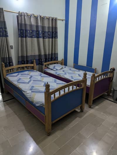 2 single beds with mattress