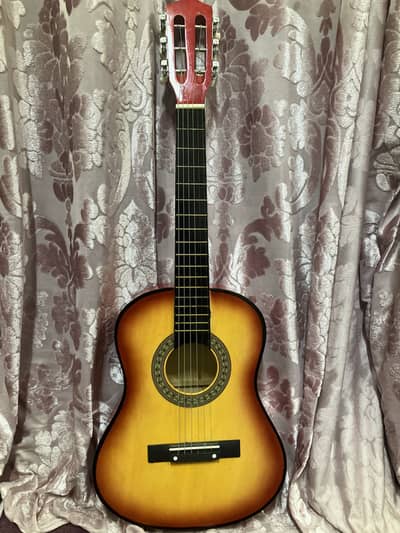 Medium size Guitar for sale