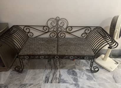 Wrought iron sofa with table