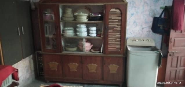 it is a set of show case and bed bed is in a1 condition and showcase a