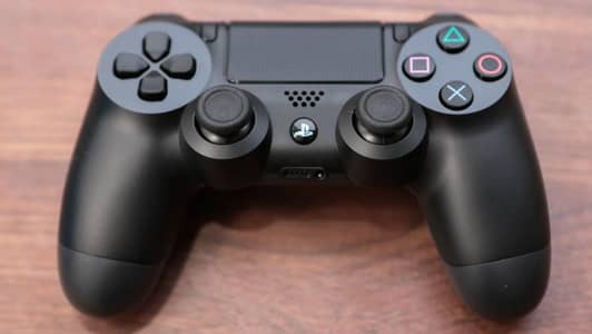 SONY PS4 CONTROLLER  WITH ADDITIONAL CHARGING CABLE AND MANUAL