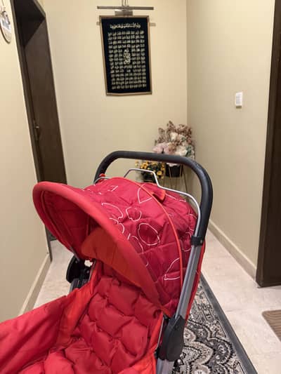 Red stroller bed for baby and toddlers