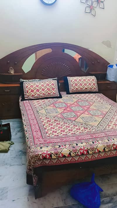 Wooden double size bed