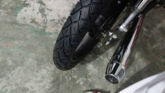7t'sAlloy rim + tyre + leather plates