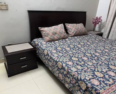 Bed with two side tables