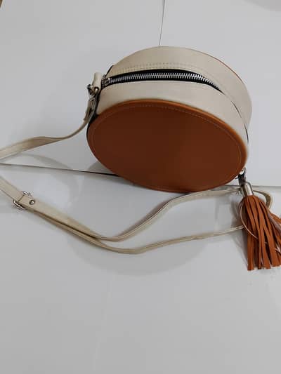 Trendy Round Crossbody Sling Bag with Tassel – 10/10 Like New