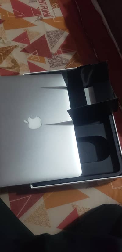 macbook pro totally original with bos 10by10 condition
