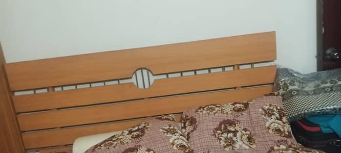 Bed and wardrobe