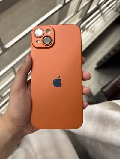 iPhone 15 plus orange case with Apple logo