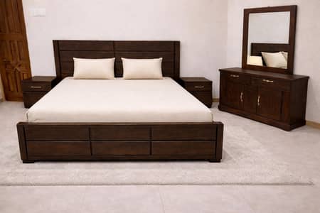 low profile bed with two side tables and dressing