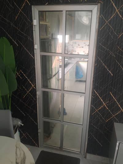 ALUMINUM DOOR WITH GLASSES AND jALI SIZEdoor  27*76