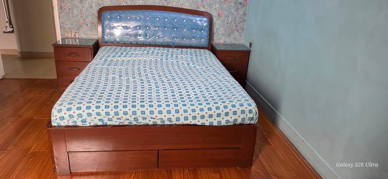 Bed with side table 0