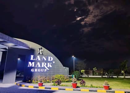 Main Double Road Residential Plot Spread Over 1 Kanal In Shaheen Orchards Available