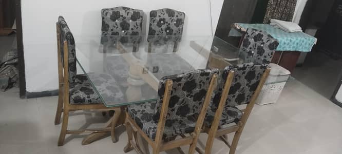 table glass top with 6 chairs
