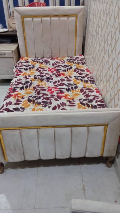 Single bed with side table