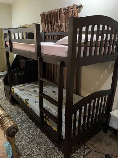 wooden beds with mattress