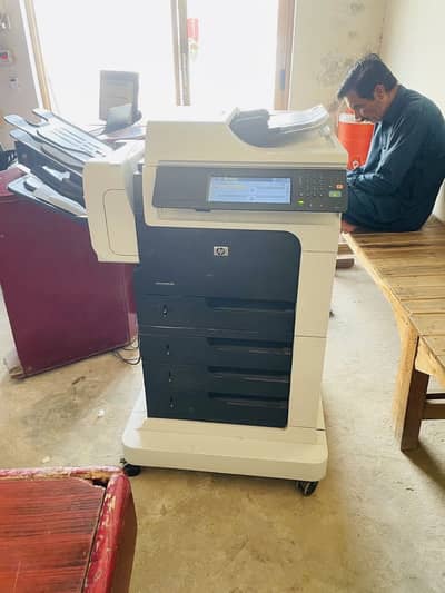 Hp m4555 photocopy machine