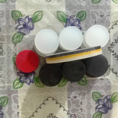 10 by 10 brand new carrom board, compelete pieces with styger.