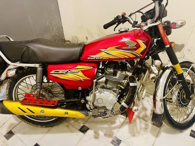 Honda 125 kickstarter register city mardan   Life time