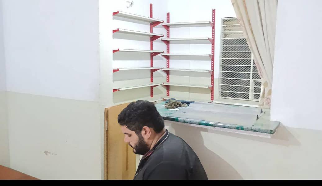 iron rack wall fitting 1