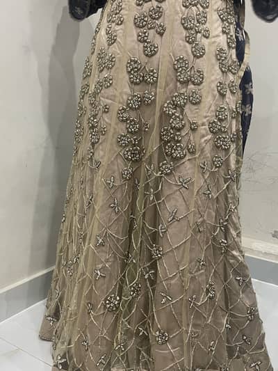 beige golden lehnga choli