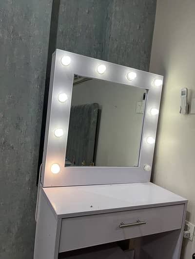 Dresser with drawer and a stool