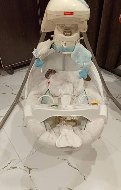 Automatic baby swing runs with cells- Rs 22,000,Lahore
