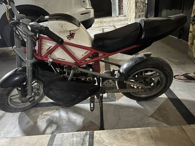 10 by 10 electric Scooty