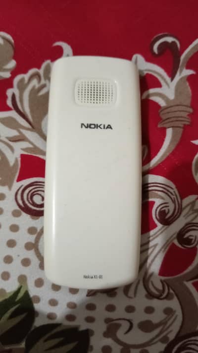 Nokia X1-01,dual sim non pta ho ga ha,original mobile ha cases be batt