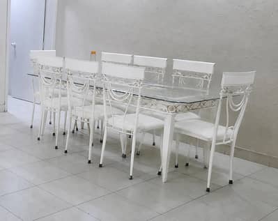 I am selling my 8 chairs dinning table