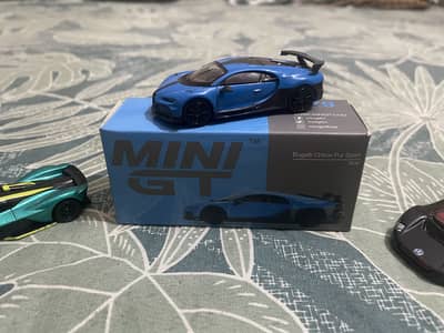 Diecast ,hotwheels mini gt bugatti chiron pur sport for sale
