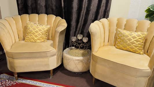 Urgent almost new 2 seater sofa with table for sell