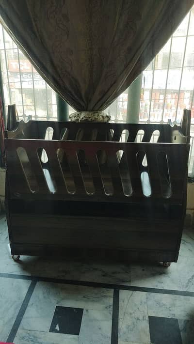 Baby cot with swing