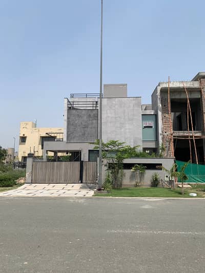 FULLY FURNISHED WITH 10KVA SOLAR 10-MARLA BUNGALOW | IMMACULATE. ICONIC. UNMISSABLE DHA LAHORE'S BEST BLOCK