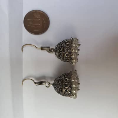 Funcky silver plated pearl jhumka .