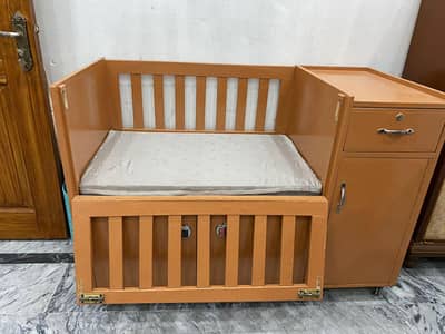 Wooden baby cot