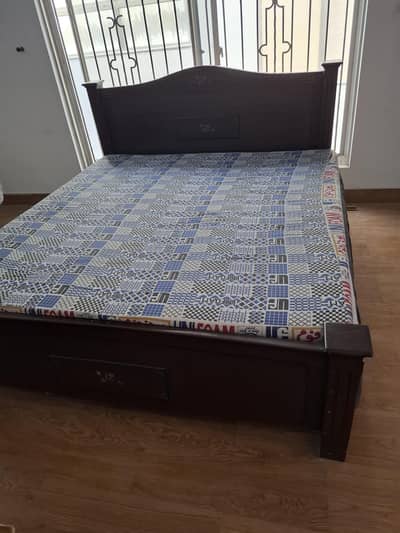 King size bed with side tables and dressing table