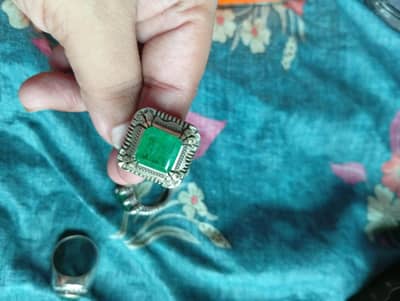 silver ring with original emerald stone