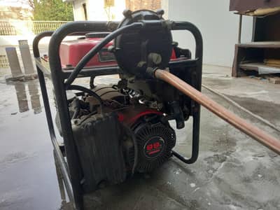 DYNAMAC Portable Petrol Generator and gass two features