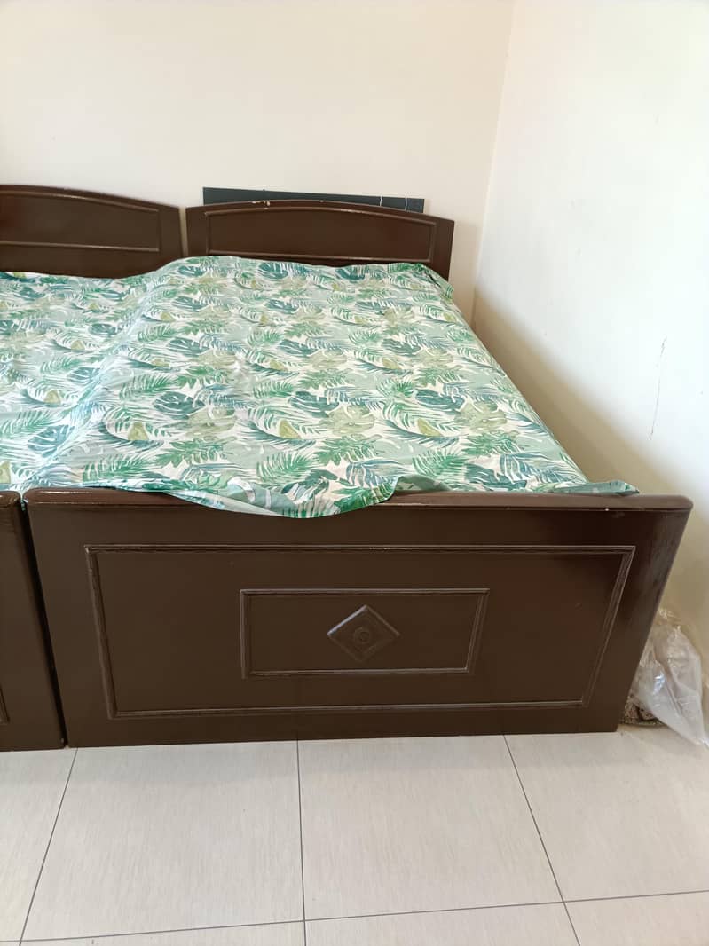 2 SINGLE BEDS 1