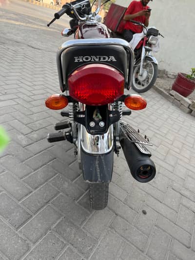 Honda 125 with 10 by 10
