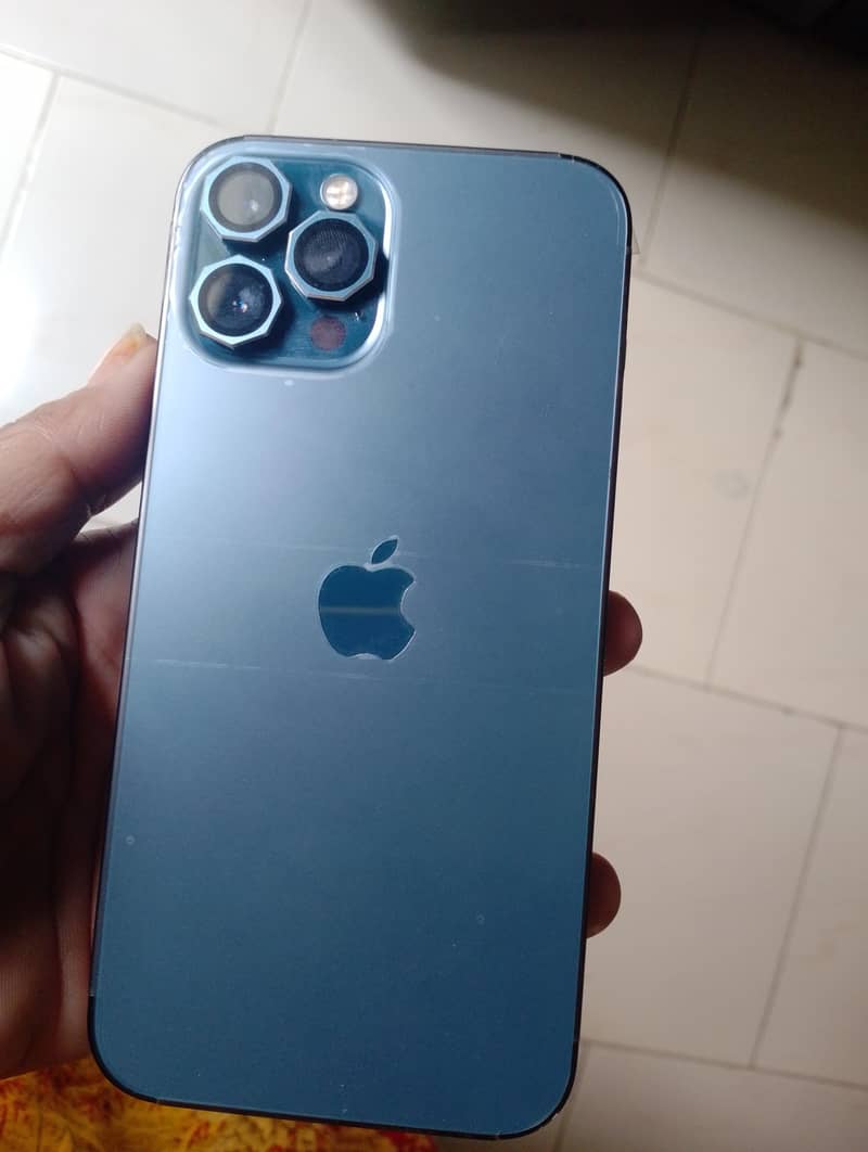 Apple iPhone 12 Pro Max. . . new condition with back cover  with lens 1