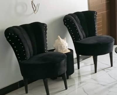 2 chairs with center table