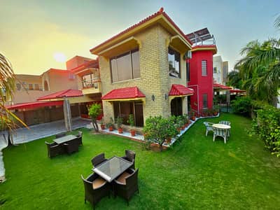 Corner green lawn 2 kanal furnished house 5 bedroom phase 5 for rent bahria town Rawalpindi rent