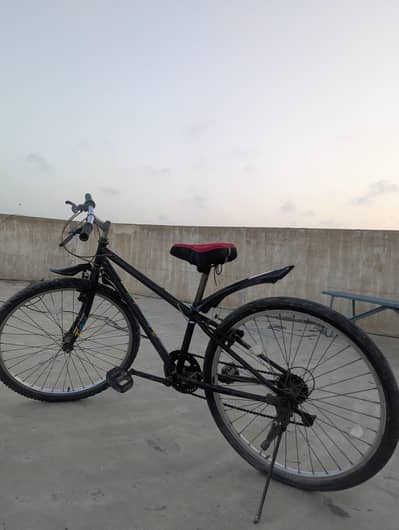 Used Black Japanese-style bicycle with 26-inch wheels