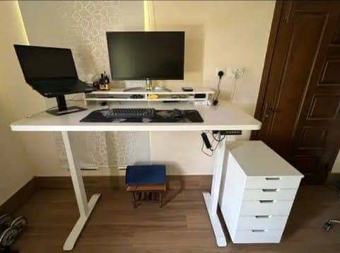 Electric height adjustable table 12