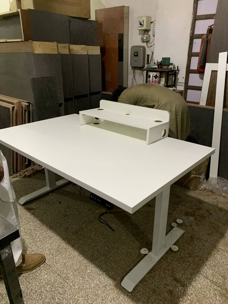 Electric height adjustable table 14
